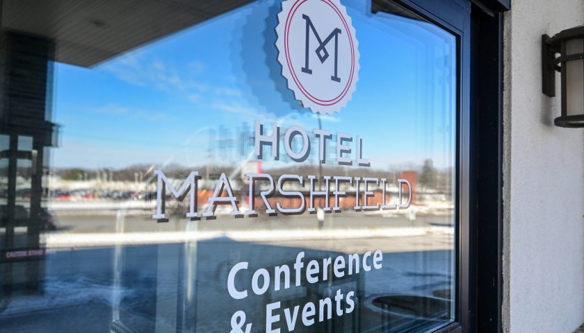 Sign on window at Hotel Marshfield in Marshfield Wisconsin advertising conferences and events
